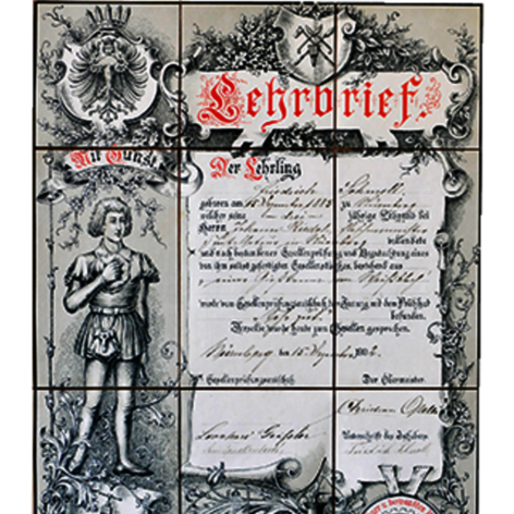 Ein historisches Lehrbrief-Dokument mit kunstvollen Verzierungen und einem abgebildeten Ritter in Rüstung.